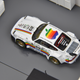 Illustration for article titled Works Wednesday: 1/64 Tarmac Works RWB 930 Apple Edition